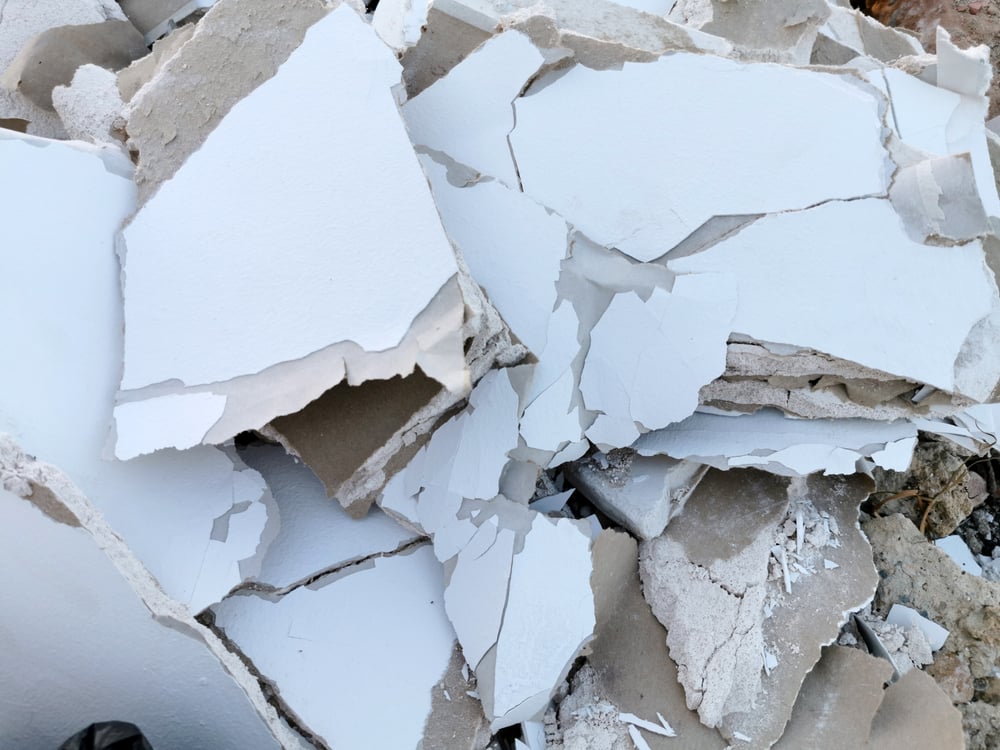 Broken,Pieces,Of,Drywall,In,A,Heap,,Building,Debris,With